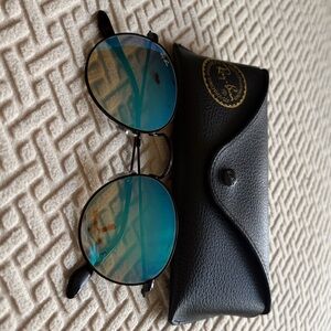 Ray-Ban Black Frames with Reflective Blue Lenses